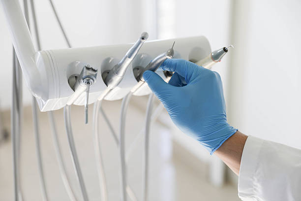Professional Tooth Extraction technician working in Clinton, OK